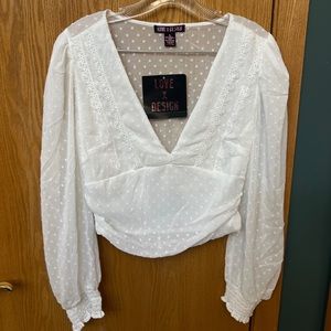 White v-neck textured blouse